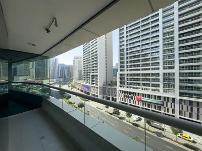 a view of a city street from a building at Werova - Spacious 3-Bedroom Near Dubai Mall in Dubai