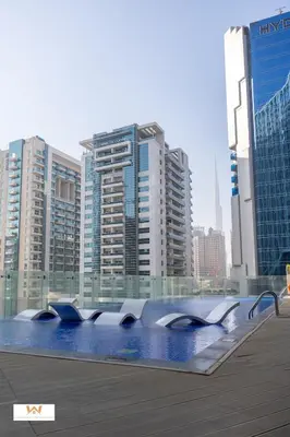 a view of a city skyline with tall buildings at Wake Up to the Burj Khalifa Stunning view 1BR Stay in Dubai