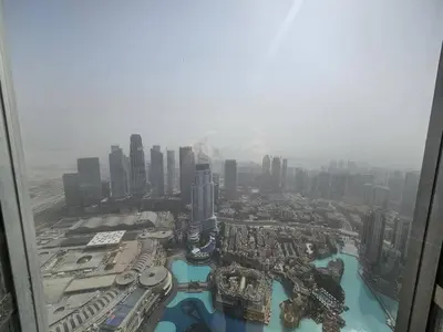 an aerial view of a city from the top of a skyscraper at Apartment in the heart of Dubai - in Burj Khalifa in Dubai