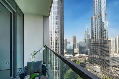 a balcony with a view of a city skyline at Stunning Full Burj Khalifa and Fountain View Apartment in Dubai