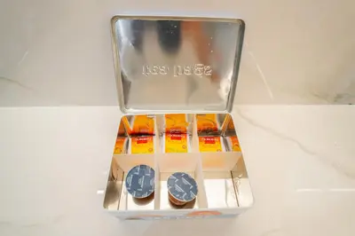a box filled with different types of cookies at EasyGo - Elegant 1-Bedroom Apartment with Balcony in Dubai
