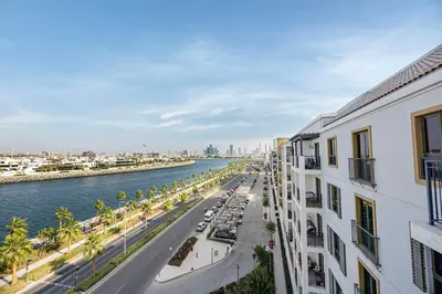 a view of a river from a building at Daniels 3BR at La Cote with Full Sea View in Dubai