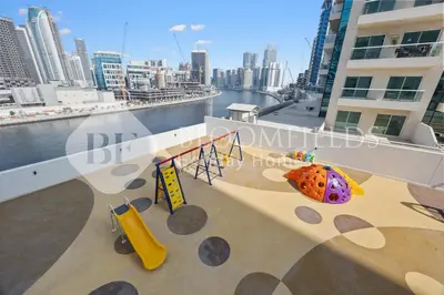 a childrens playground on the roof of a building at Bloomfields Canal View 2Br Apt Canal Business in Dubai