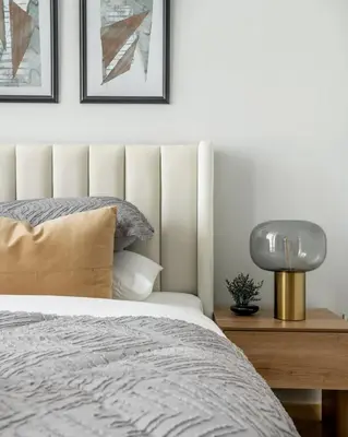 a bedroom with a bed and a lamp on a table at GuestReady - Stylish retreat near Dubai Mall in Dubai