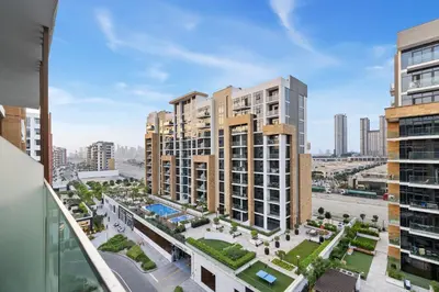an aerial view of a city with tall buildings at Chic Modern Studio in Meydan Azizi Riviera 26 in Dubai