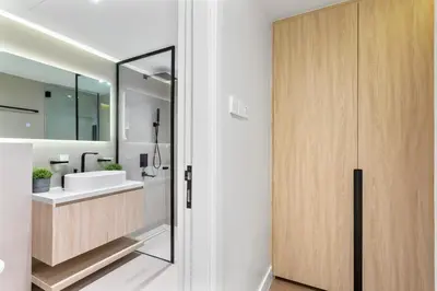 a bathroom with a sink and a mirror at Cozy 2Bedroom Villa with Private Pool in Springs in Dubai