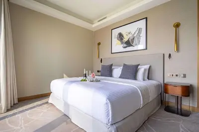 a bedroom with a large white bed in a room at Frank Porter - Address Residences Dubai Opera Tower 1 in Dubai