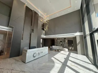 a lobby with a reception desk in a building at Amazing Dubai Silicon Oasis Rental Apartments in Dubai