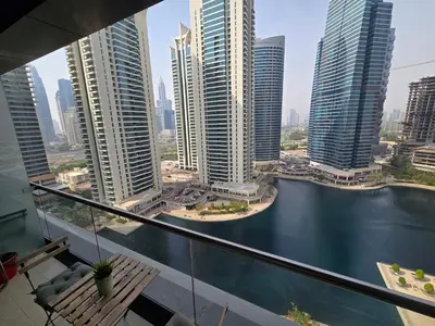 a view of the city from a balcony in a building at Click Stay - JLT - Entire Studio & Balcony Lakes view Apartment -HW in Dubai
