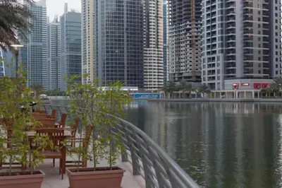 a view of a city with buildings and a body of water at Click Stay - JLT - Entire Studio & Balcony Lakes view Apartment -HW in Dubai