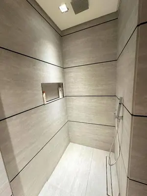 a home theater with at Luxury Studio with Balcony, Pool, Coworking in JVC in Dubai