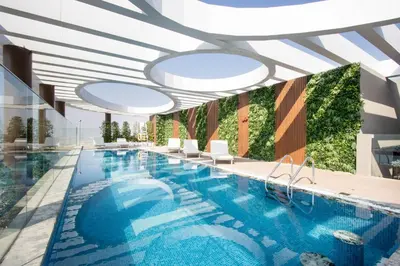 an image of a swimming pool in a hotel at Luxury 1BR High Floor Rooftop Pool Access in Dubai