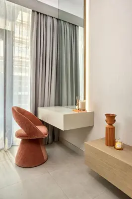 a room with a desk and a chair in front of a window at Elegant Luxury Studio 12th Floor Sky high View in Dubai