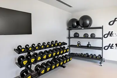 a room with a bunch of black and yellow helmets at Ultra Luxury! Burj Crown ! 1BR ! Beautiful View in Dubai