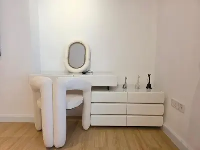 a dressing room with a white dressing table and a mirror at Spacious 2BR Apartment Rimal 1 JBR EB in Dubai