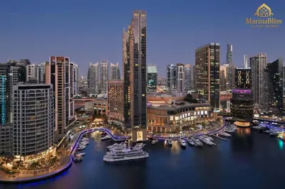 a view of a city with boats in the water at Deluxe 5 stars Suite - JW Marriott-Marina Mall - Once you see it, you book it! in Dubai