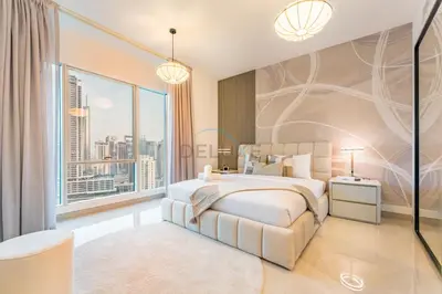 a bedroom with a large bed and a large window at Full Yacht Harbour and Marina Canal Views, Walking Distance to Tram Station and Beach - Shemara W2, Dubai Marina by Deluxe Holiday Homes in Dubai