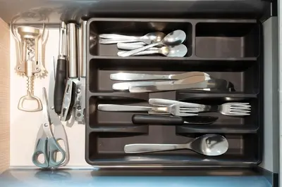 a black tray with utensils in a drawer at Luxury 1BR Apartment - Pool View - The Crest Dubai in Dubai