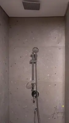 a shower head in a bathroom with at Upscale 1BR Paragon by IGO Near Downtown in Dubai