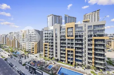 an aerial view of a city with tall buildings at Bloomfields Modern STU Azizi Riviera in Dubai