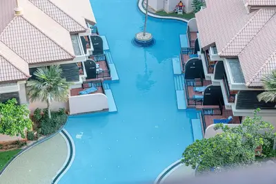 an aerial view of a pool in a apartment complex at Luxe Royal Amwaj Palm Jumeirah Beach Access in Dubai