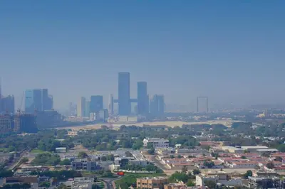 an aerial view of a city with tall buildings at Prime Stay Elite, Dubai Mall & Burj Khalifa View in Dubai