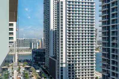 an aerial view of a city with tall buildings at Luxury 1BR with Private Beach & Pool! in Dubai