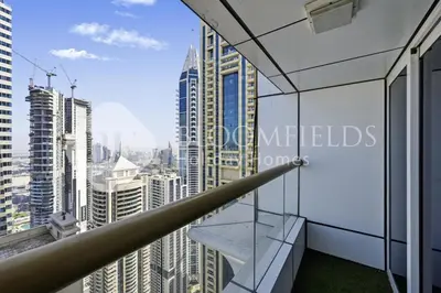 a view of the city from the balcony of a skyscraper at Bloomfields Iconic 2BR Elite Residence Marina in Dubai