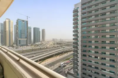 a view of a city with tall buildings and a highway at VayK - Vibrant and Great 1BR in the Marina in Dubai