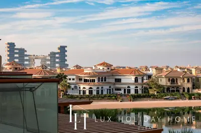 a view of a large house in a city at LUX The Palm Sea View Studio in Dubai