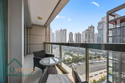 a balcony with a view of a city at Skyline Bliss Luxury Apartment Dubai in Dubai