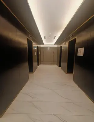 a hallway of an elevator in a building at Fully furnished studio with amenities in Dubai in Dubai