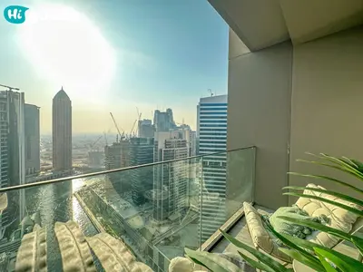 a view of a city from the balcony of a building at HiGuests - High Rise Studio Haven in Business Bay in Dubai