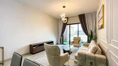 a living room with a couch and chairs and a table at 1BR Study luxury Furnished Utilities Included DXB in Dubai