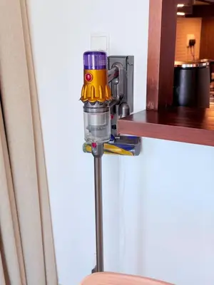 a fire extinguisher on a pole in a room at Dubai Mall connected, 38th floor, Amazing pool in Dubai