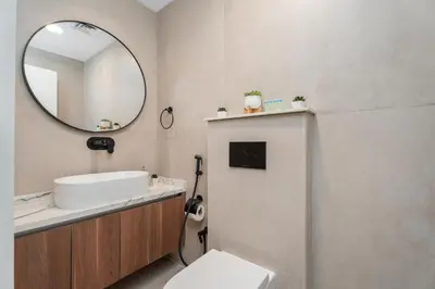 a bathroom with a sink and a mirror at Gala Guests - Marina Views Bright Balcony Collection in Dubai