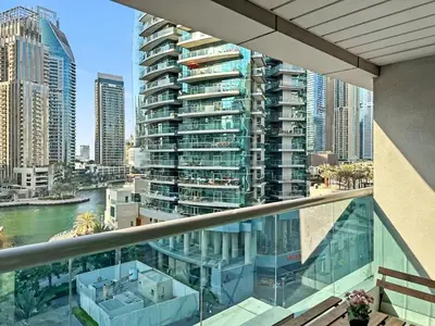 an apartment balcony with a view of a city at Breathtaking 2BR in Marina - Steps to Metro in Dubai