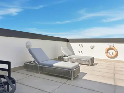 a hospital room with two chairs and a mirror at BLVD - Stylish Stay with Relaxing Balcony View in Dubai