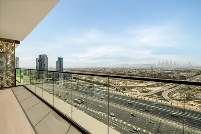 a balcony with a view of a highway at GuestReady | 2 BR | Luxury Apt with Private Pool in Dubai