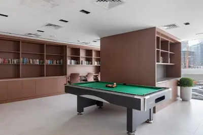 a billiard room with a pool table in it at Modern studio in the centre of Dubai in Dubai
