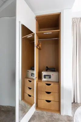 a room with a closet with drawers at Modern Studio with Balcony Orra, Harbour, Marina in Dubai
