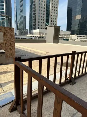 a wooden bench sitting on top of a building at Unique 1 bed apart in Business Bay close to downtown in Dubai