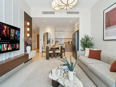 a living room with a couch and a table at New-Best Burj Khalifa View I 2BR I Walk DubaiMall in Dubai