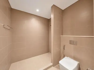 a bathroom with a toilet and a shower at New-Best Burj Khalifa View I 2BR I Walk DubaiMall in Dubai