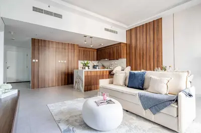a living room with a couch and a table at Frank Porter - Blvd Central in Dubai