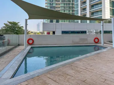 a swimming pool on the roof of a building at Frank Porter - Address Beach Resort Tower in Dubai