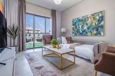 a living room with a couch and a table at Frank Porter - Eleganz 2 by Danube in Dubai