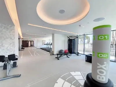 a large room with a gym with exercise equipment at Vacationer l Stunning 1 Bed l Sea View l Private Beach Access in Dubai