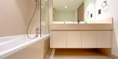 a bathroom with a sink and a shower and a tub at Luxury in Dubai 2 bedroom apartment with balcony in Dubai