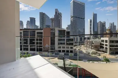 a view of a city from the balcony of a building at Modern Studio in Business Bay in Dubai